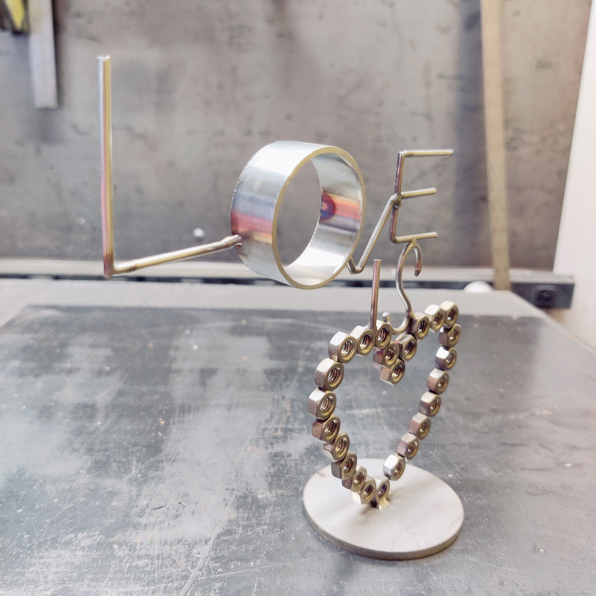 "LOVE IS NUTS" Stainless Steel Heart Sculpture | Handcrafted Industrial TIG Welded Art