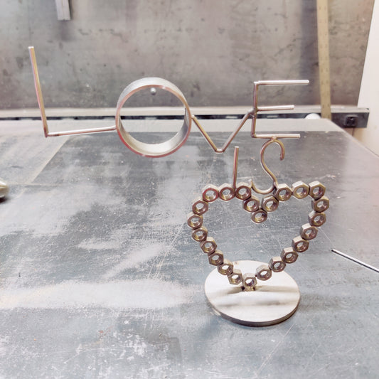 "LOVE IS NUTS" Stainless Steel Heart Sculpture | Handcrafted Industrial TIG Welded Art